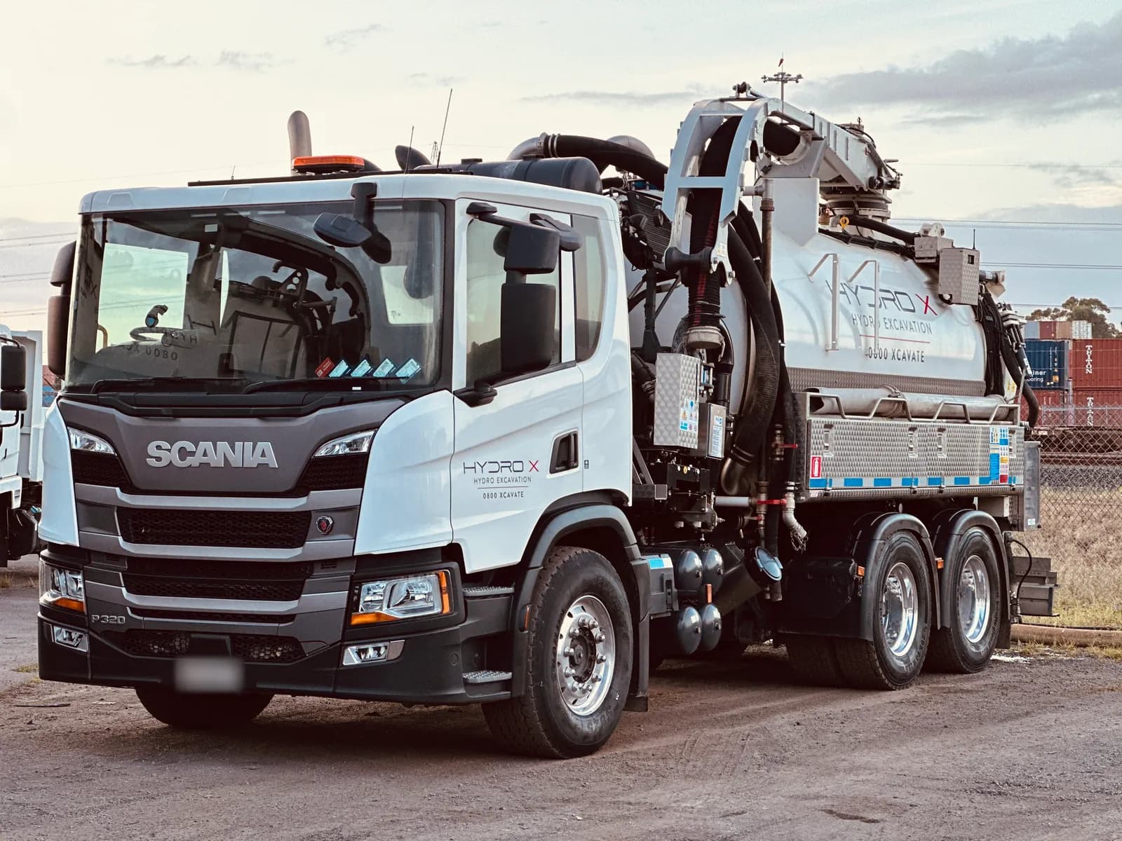 Large hydro excavation truck, Scania, front three-quarter view with the boom stowed